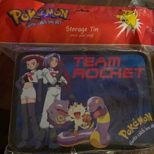 Vintage Pokémon team rocket storage tin